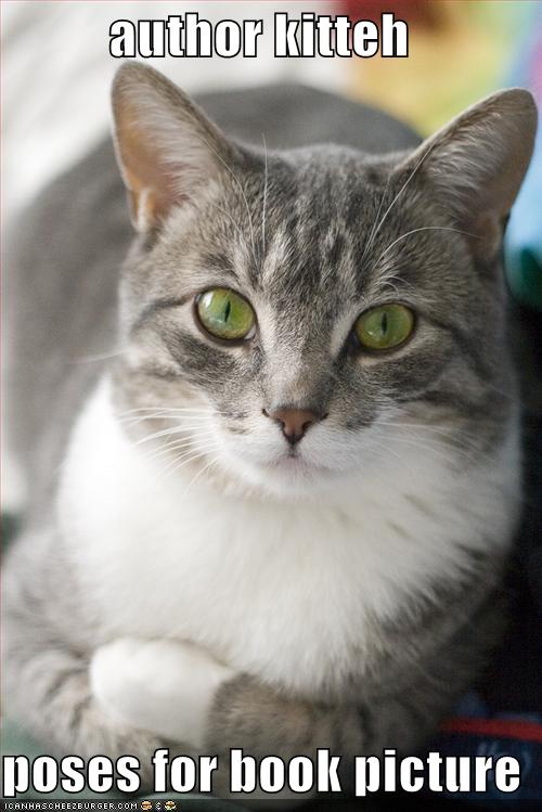 author kitteh  poses for book picture