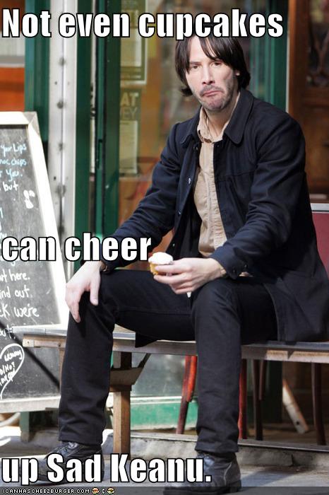 Not even cupcakes can cheer  up Sad Keanu.