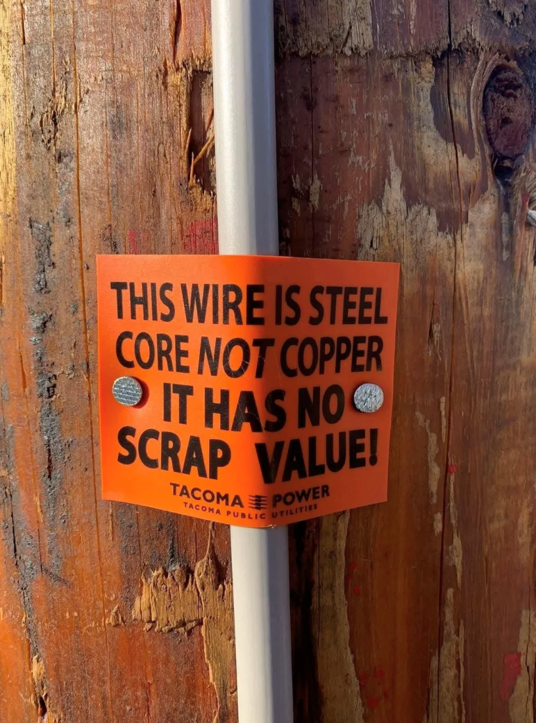 THIS WIRE IS STEEL CORE NOT COPPER IT HAS NO SCRAP VALUE! TACOMA Ξ POWER TACOMA PUBLIC UTILITIES