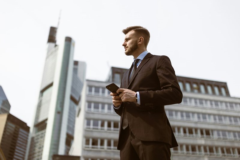 Young professional employee looking away from camera after a challenging job interview.