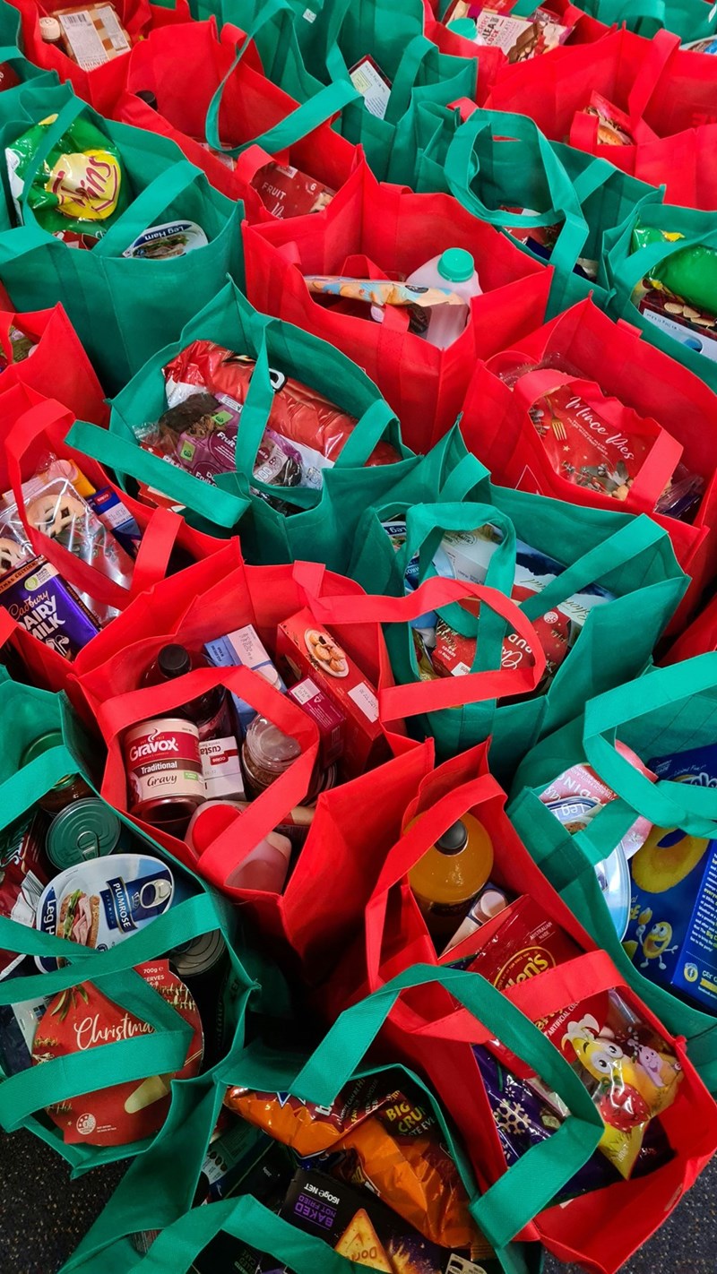 Red and green bags filled with groceries