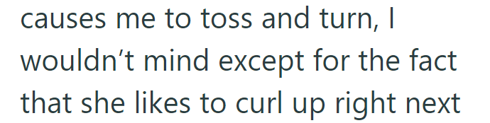 causes me to toss and turn, I wouldn't mind except for the fact that she likes to curl up right next