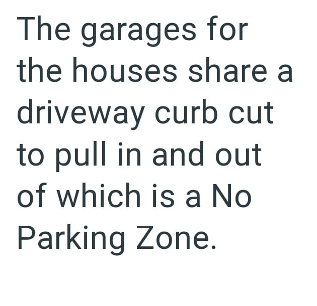 The garages for the houses share a driveway curb cut to pull in and out of which is a No Parking Zone.