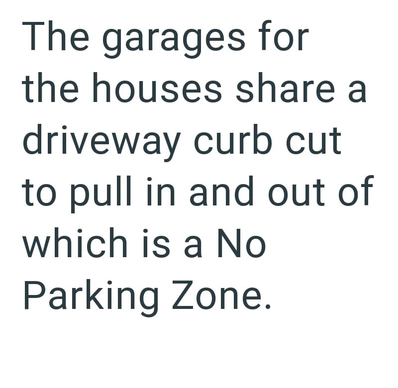 The garages for the houses share a driveway curb cut to pull in and out of which is a No Parking Zone.