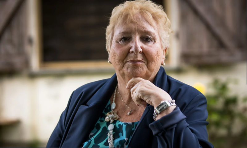 Older woman looking judgmental of the family's choices.