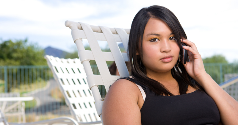 Woman making a call.