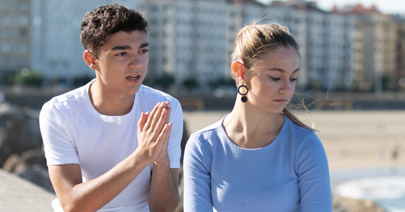 Man begging for forgiveness.