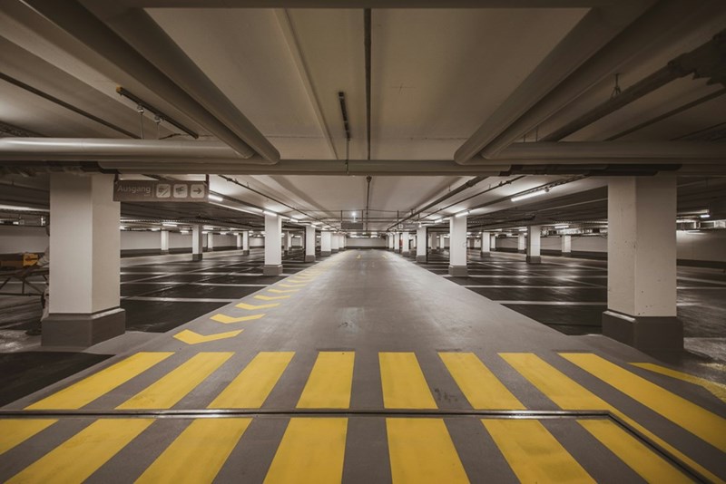An empty parking garage lot.