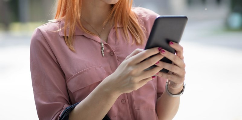 Women texting with her phone 