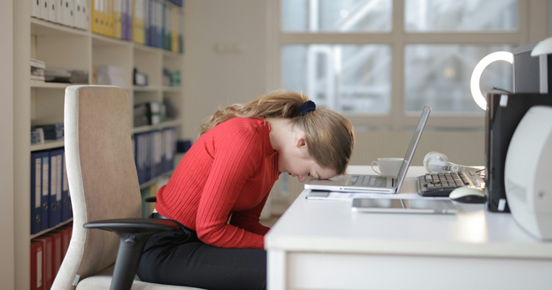 Woman struggling to work at her home office. 