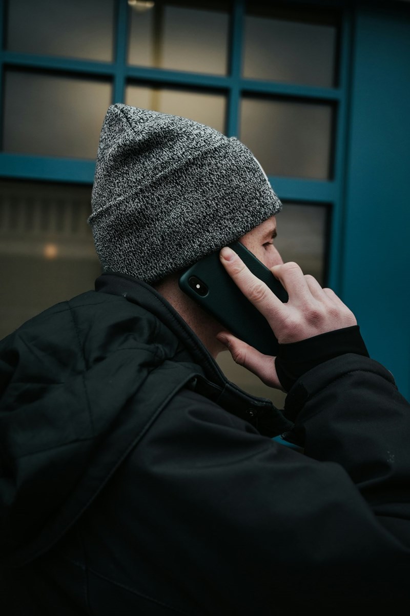 A man making a phonecall on his cellphone