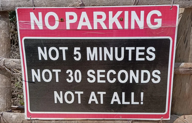 NO PARKING NOT 5 MINUTES NOT 30 SECONDS NOT AT ALL!