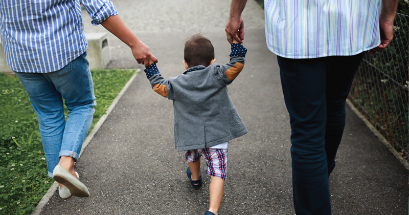 Parents angrily leaving a preschool. 