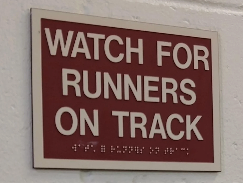 WATCH FOR RUNNERS ON TRACK