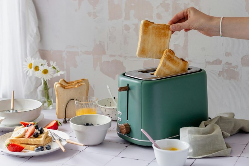 Tenant uses toaster to make breakfast.