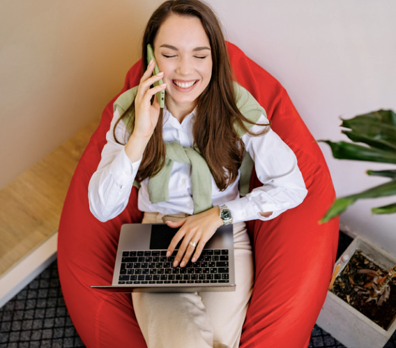 Woman on the phone with a new company when they offer her the job.