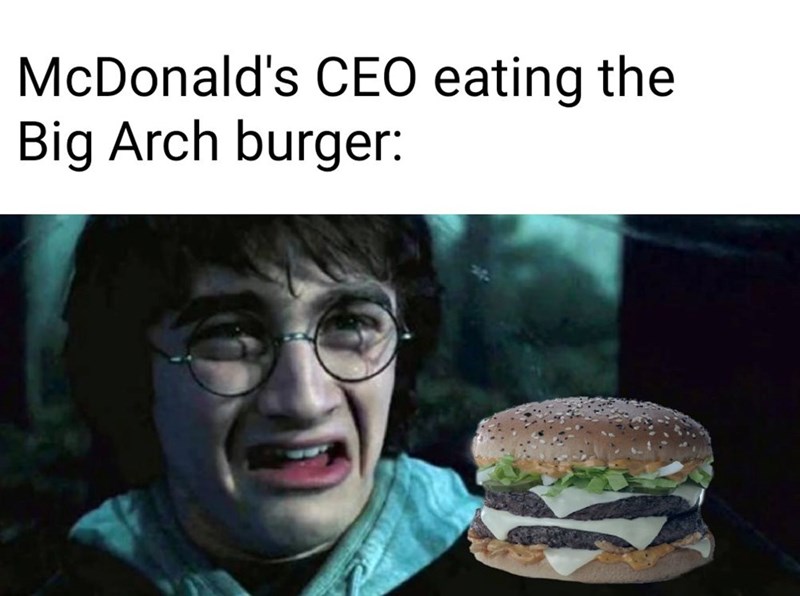 McDonald's CEO eating the Big Arch burger: