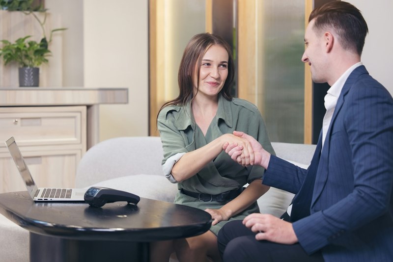 Job interviewer looks bemused at candidate's answers.