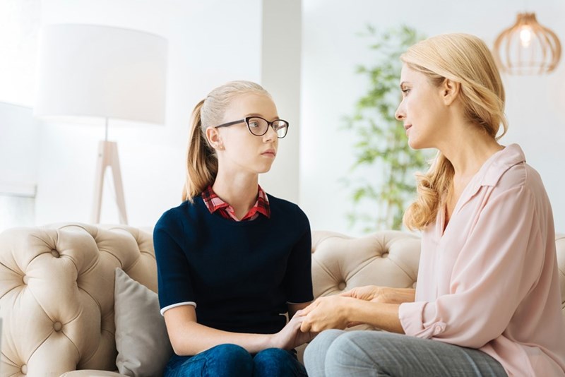 A mom has a difficult discussion with her teenage daughter