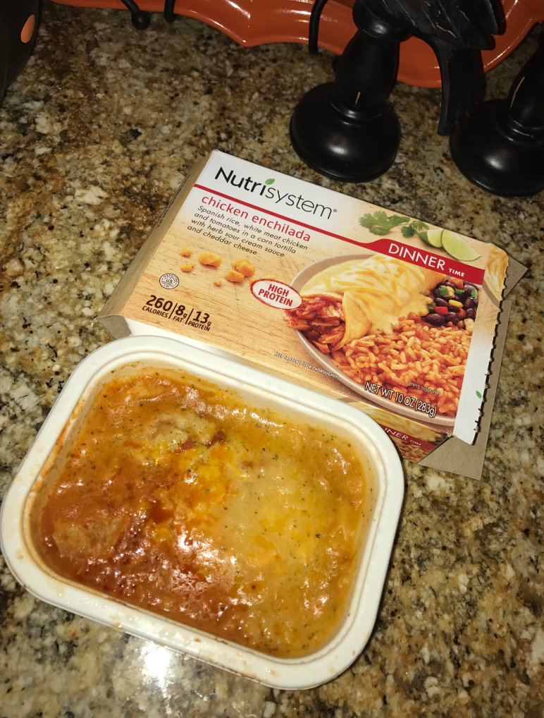 Nutrisystem chicken enchilada Spanish rice, white meat chicken and tomatoes in a corn tortilla with herb sour cream sauce and cheddar cheese DINNER TIM HIGH PROTEIN 260/8, 13, CALORIES FAT PROTEIN HR coom SHOROUGH INER