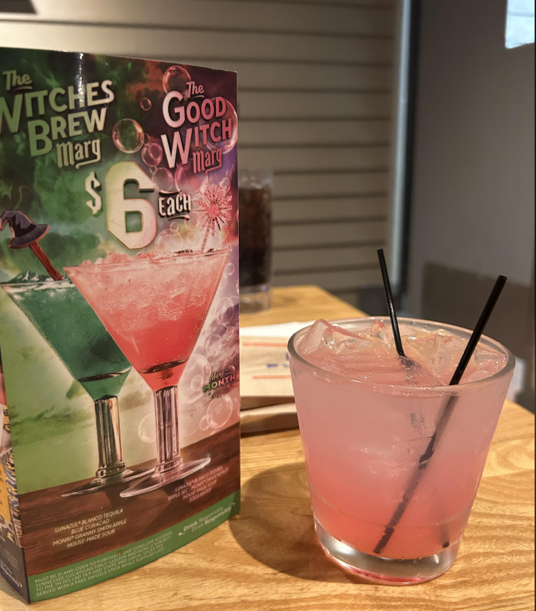 The WITCHES BREW Mary $6 The GOOD WITCH Each mary LUNAZUL BLANCO TEQUILA BLUE CURACAO MONIN GRANNY SMITH APPLE HOUSE-MADE SOUR SUME E AND CONS MUST BE 21 AND OVER TO PURCHIATOR AN TENNESSEE LOCAT SA TO THE TN 15% SERVED WITH A FREE FAND L D STATE ESTICK WHILE SUPPLIE LUNATUANCOEDURA TRPLE SEC-MOMY HOUSE HADE SOUR Drink Repo Dove Mary MONTH