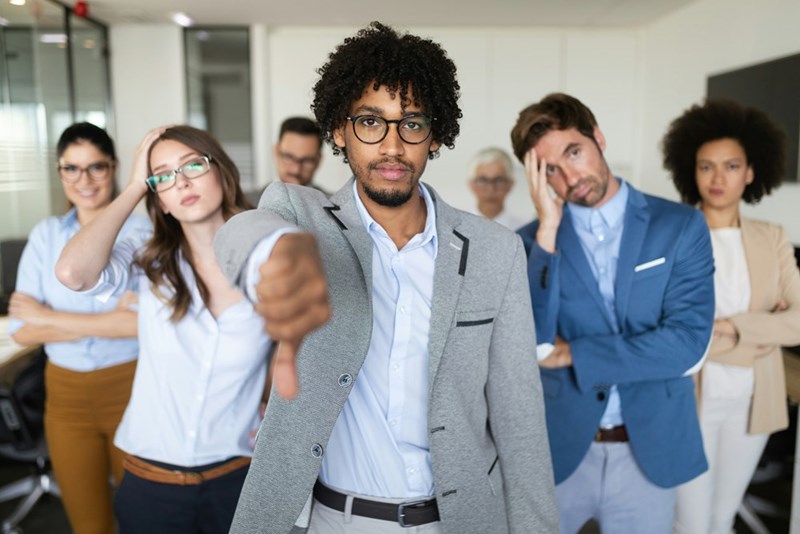 A group on unsuccessful business people at badly managed company