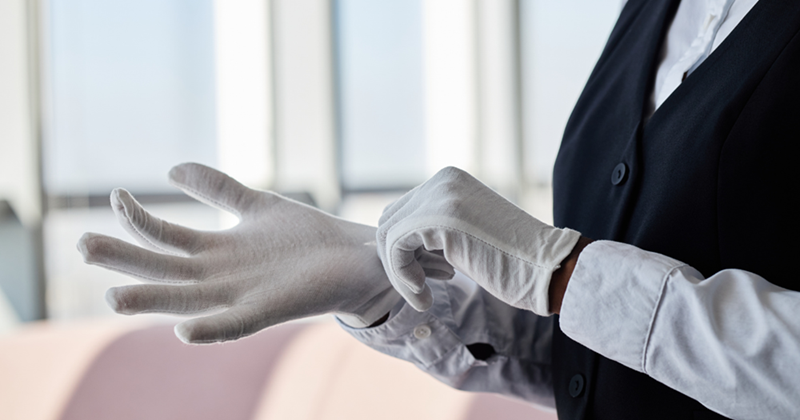 Restaurant Worker Putting on Gloves