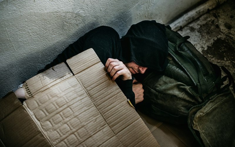 Homeless sleeping on the sidewalk