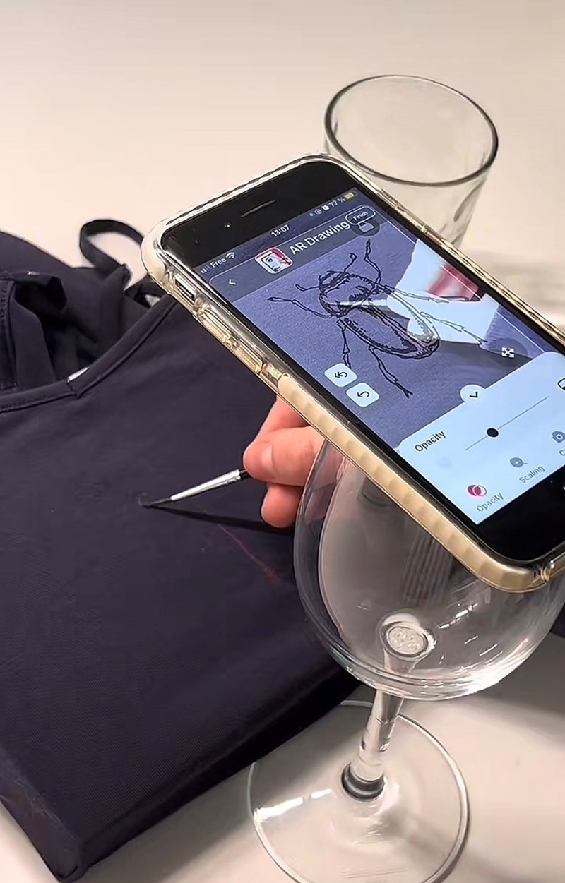 Free く 13:07 77% AR Drawing Opacity 7 Opacity Scaling