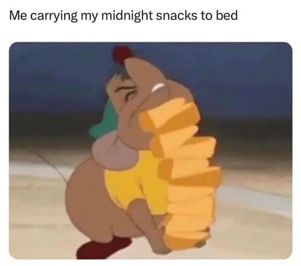 Me carrying my midnight snacks to bed