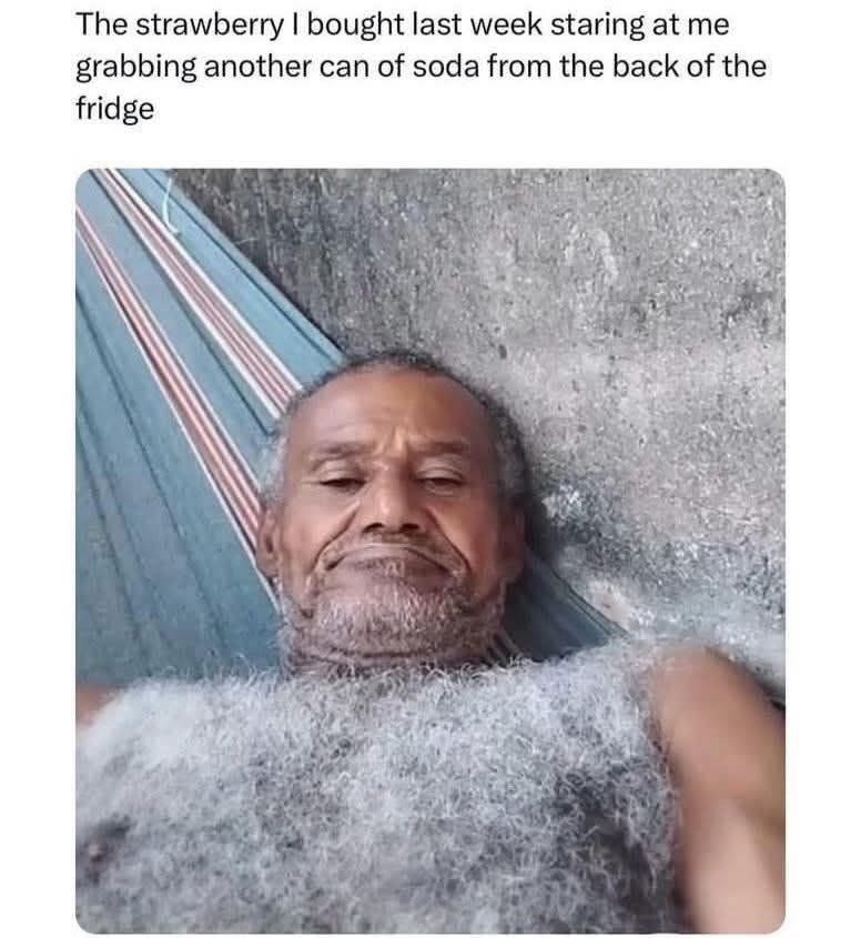 The strawberry I bought last week staring at me grabbing another can of soda from the back of the fridge