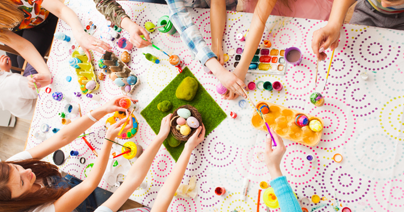 Top View Kids Hands with Easter Crafts