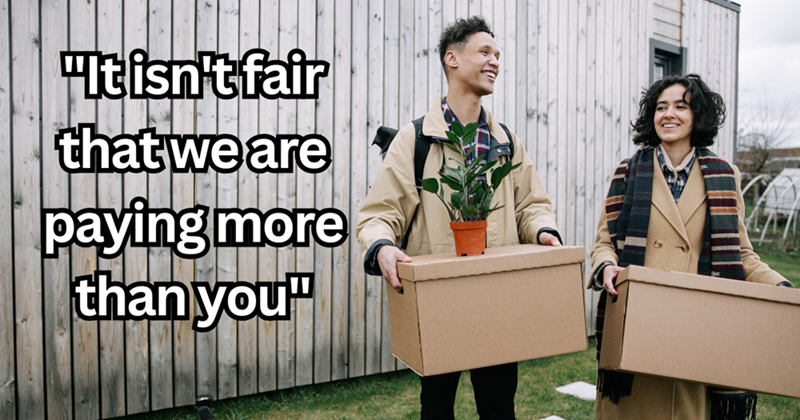 Smiling Couple Holding Brown Boxes
