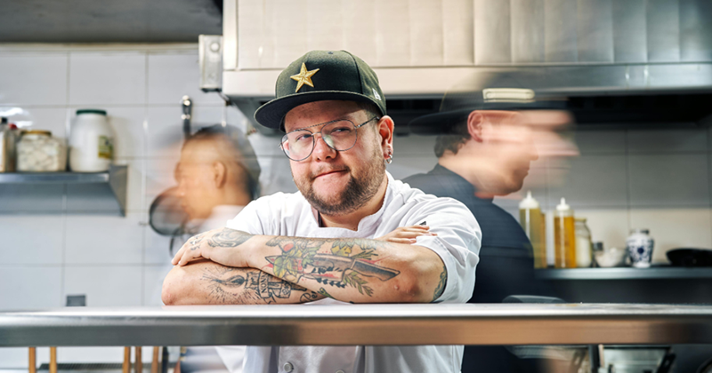 Chef of a catering company working in the kitchen. 