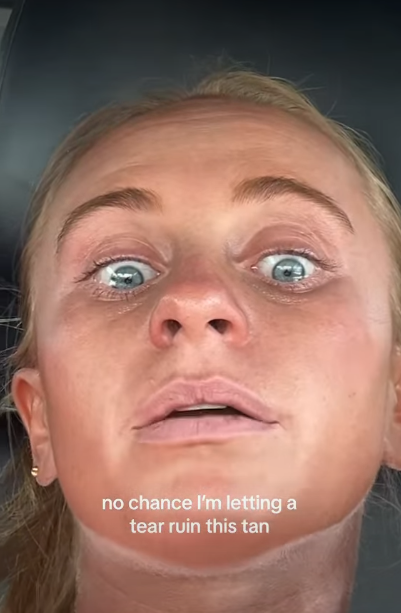 no chance I'm letting a tear ruin this tan