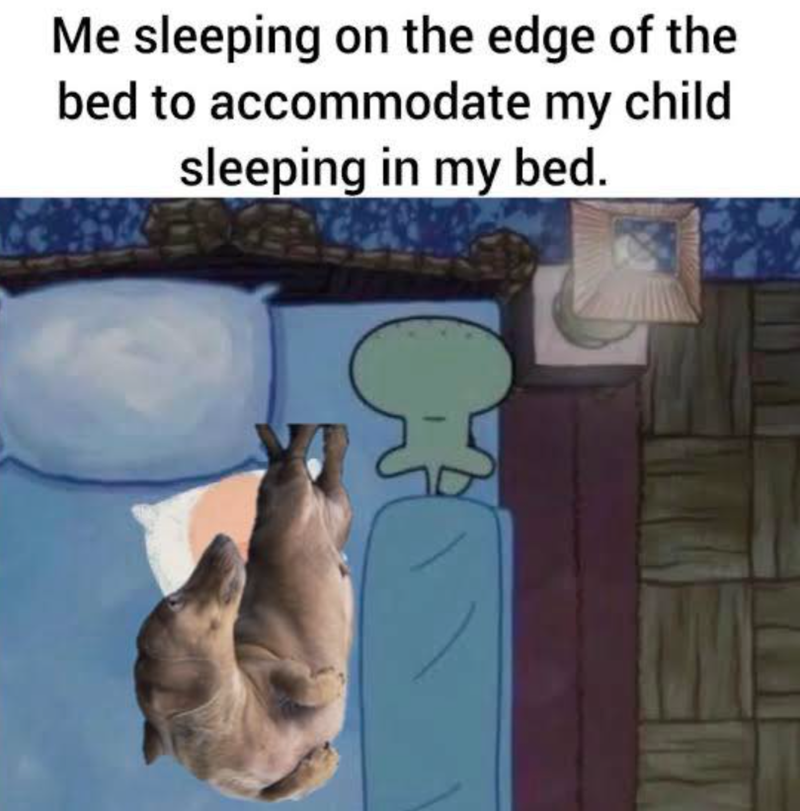 Me sleeping on the edge of the bed to accommodate my child sleeping in my bed.