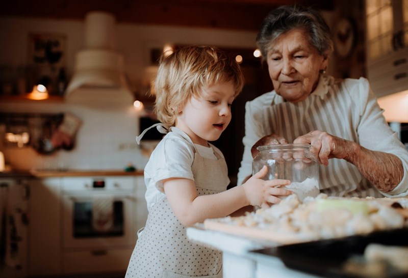 Grandmother and toddler play together.