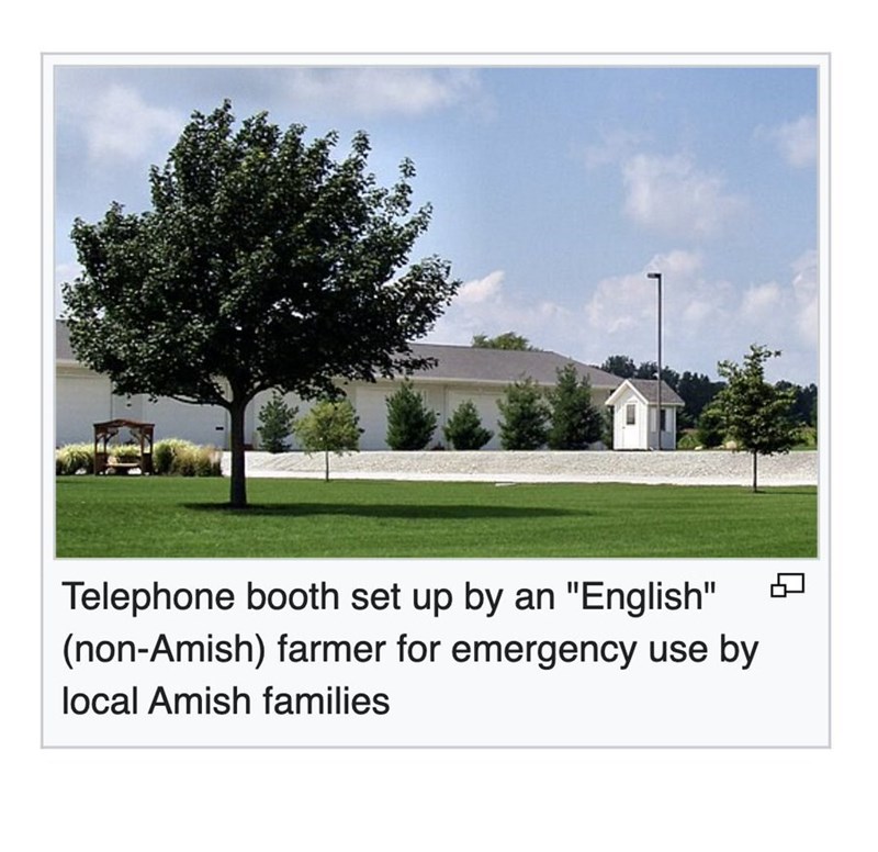 Telephone booth set up by an "English" (non-Amish) farmer for emergency use by local Amish families