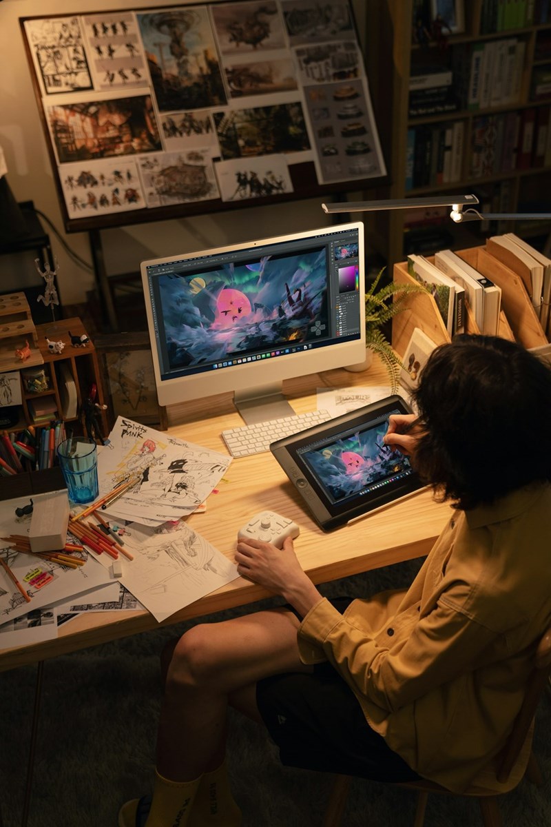 Artist creating digital art on a desk