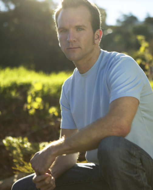 Man confronting his neighbor about trespassing.