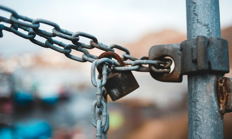 A close up of a rusty padlock