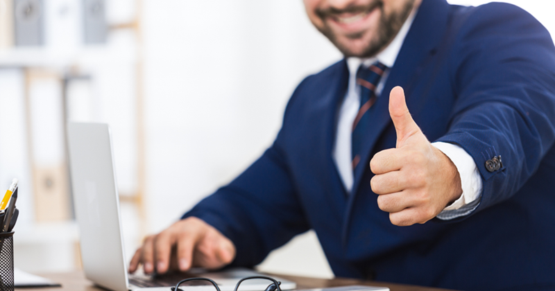 Boss giving a thumbs up to his workers.