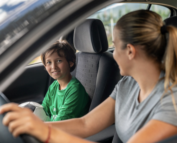 Mom driving other kids for a carpool.