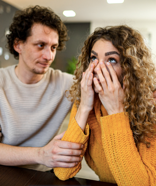 Man supporting his wife when she's upset about a friendship.