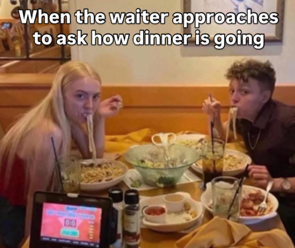 When the waiter approaches to ask how dinner is going 06