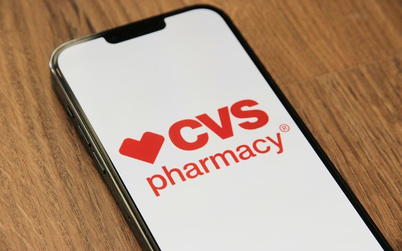 A cellphone with a CVS logo on it.