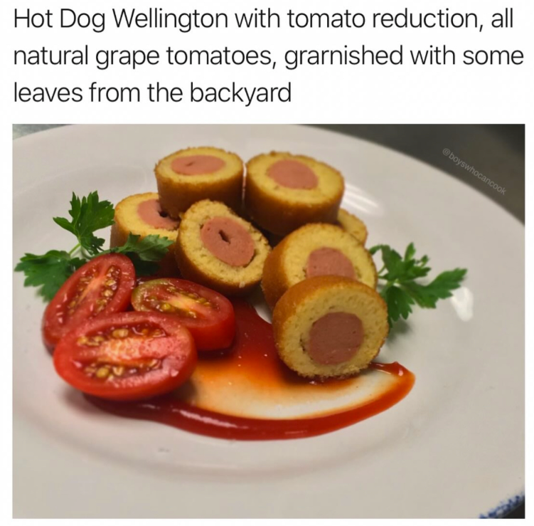 Hot Dog Wellington with tomato reduction, all natural grape tomatoes, grarnished with some leaves from the backyard @boyswhocancook