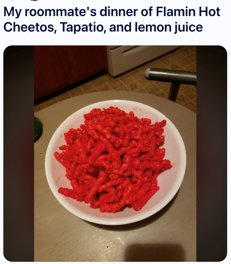 My roommate's dinner of Flamin Hot Cheetos, Tapatio, and lemon juice