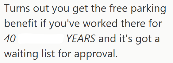 Turns out you get the free parking benefit if you've worked there for 40 YEARS and it's got a waiting list for approval.