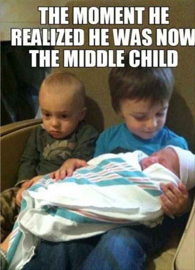 THE MOMENT HE REALIZED HE WAS NOW THE MIDDLE CHILD